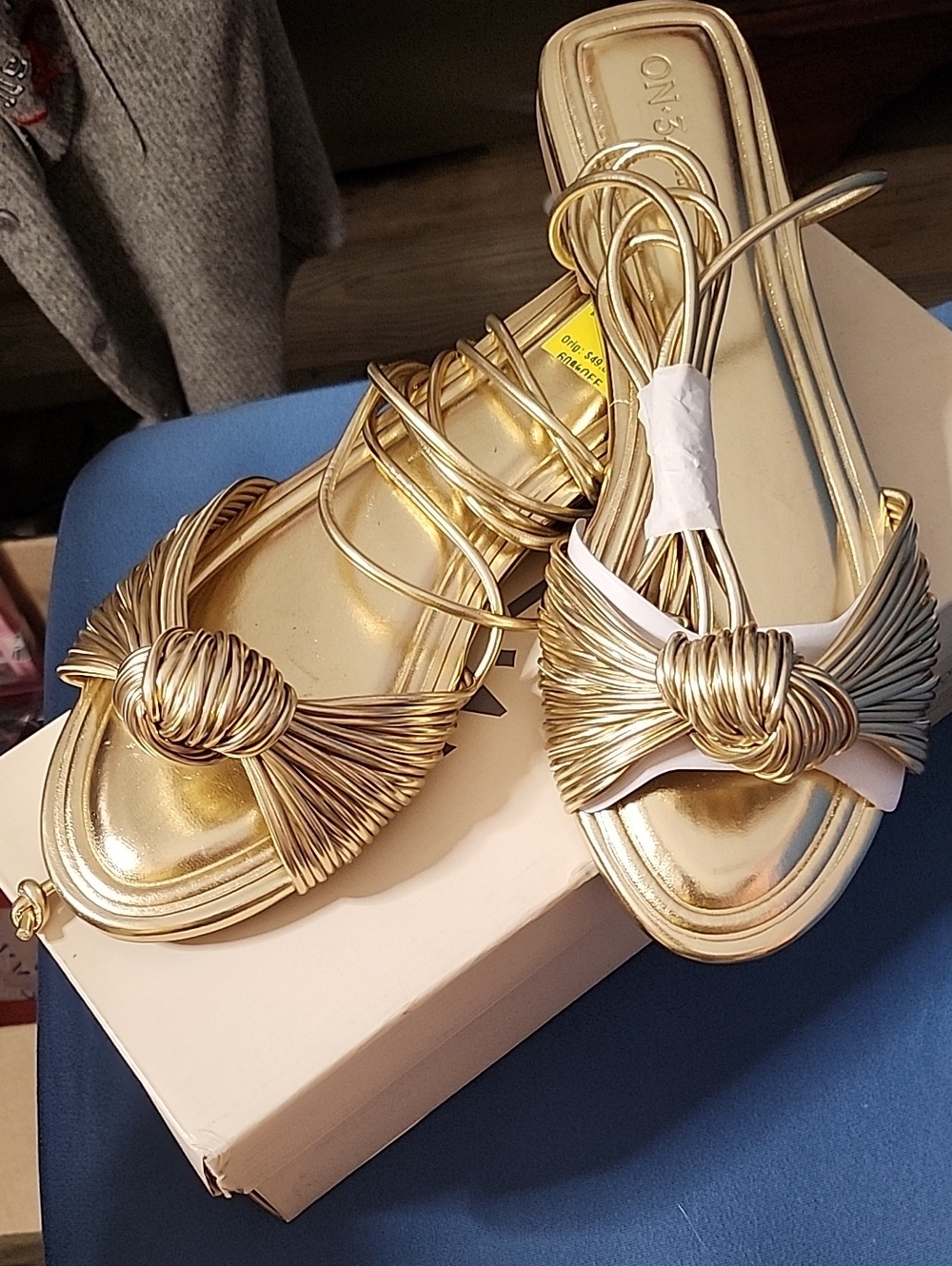 Size 9 on 34th gold strappy sandals